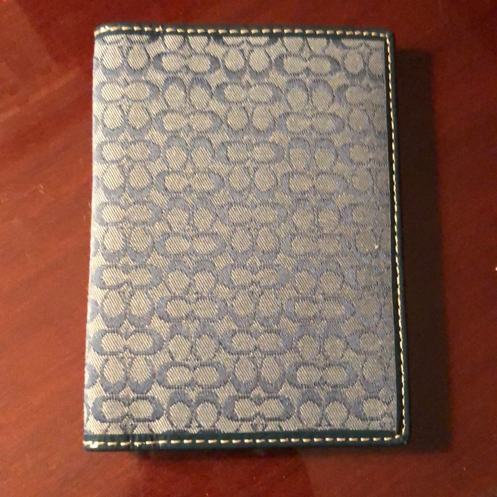 COACH women’s passport holder / wallet